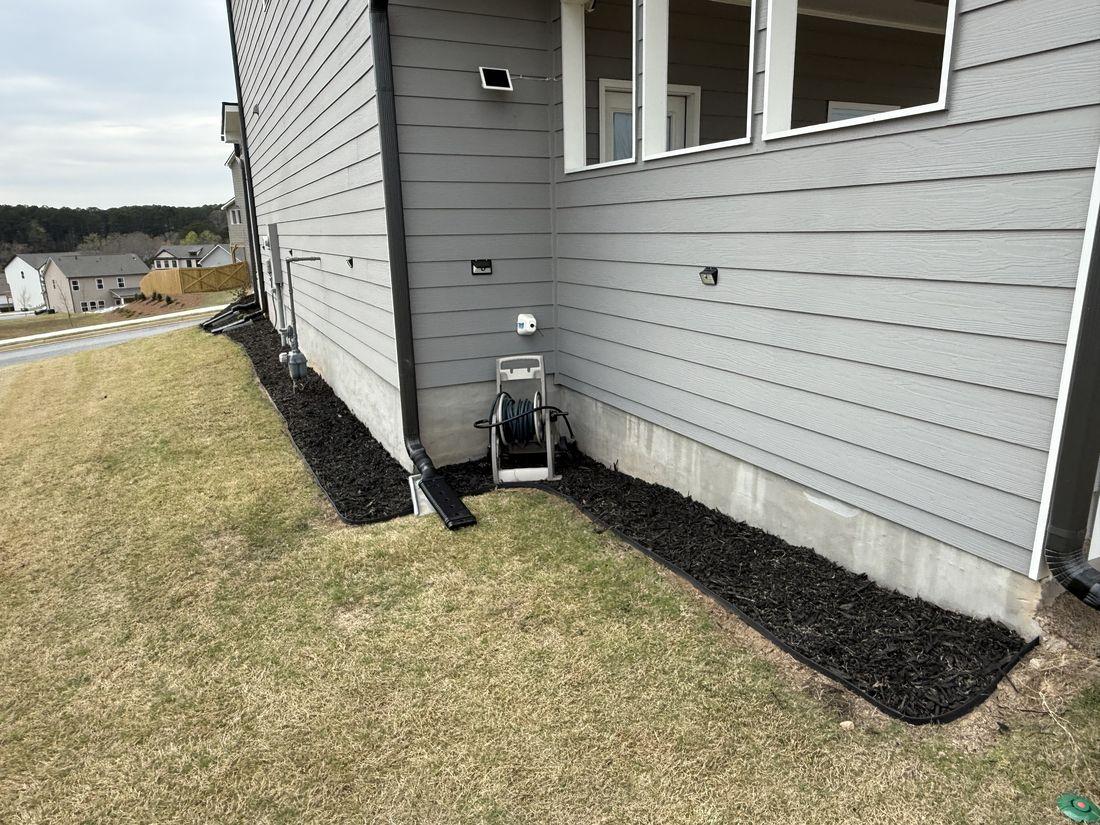 Home exterior and foundation beds serviced by Kaus Cuts