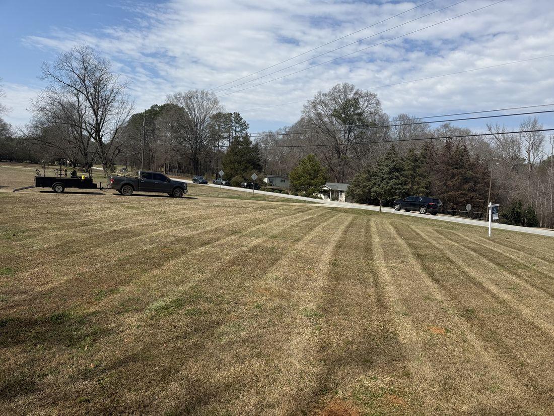 Lush green lawn โ the result of healthy, aerated soil