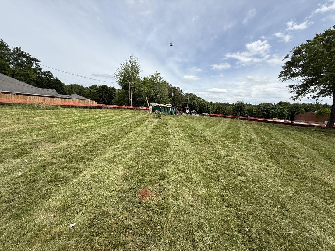 Healthy, well-watered green lawn by Kaus Cuts
