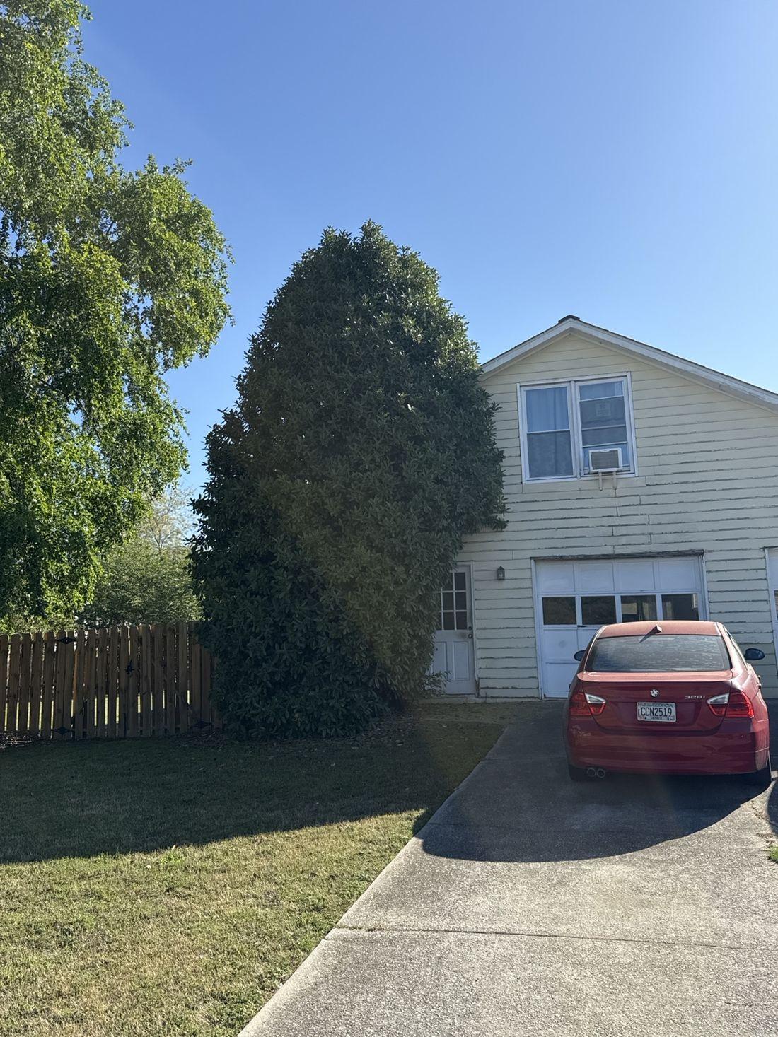 Tidy, debris-free yard serviced by Kaus Cuts