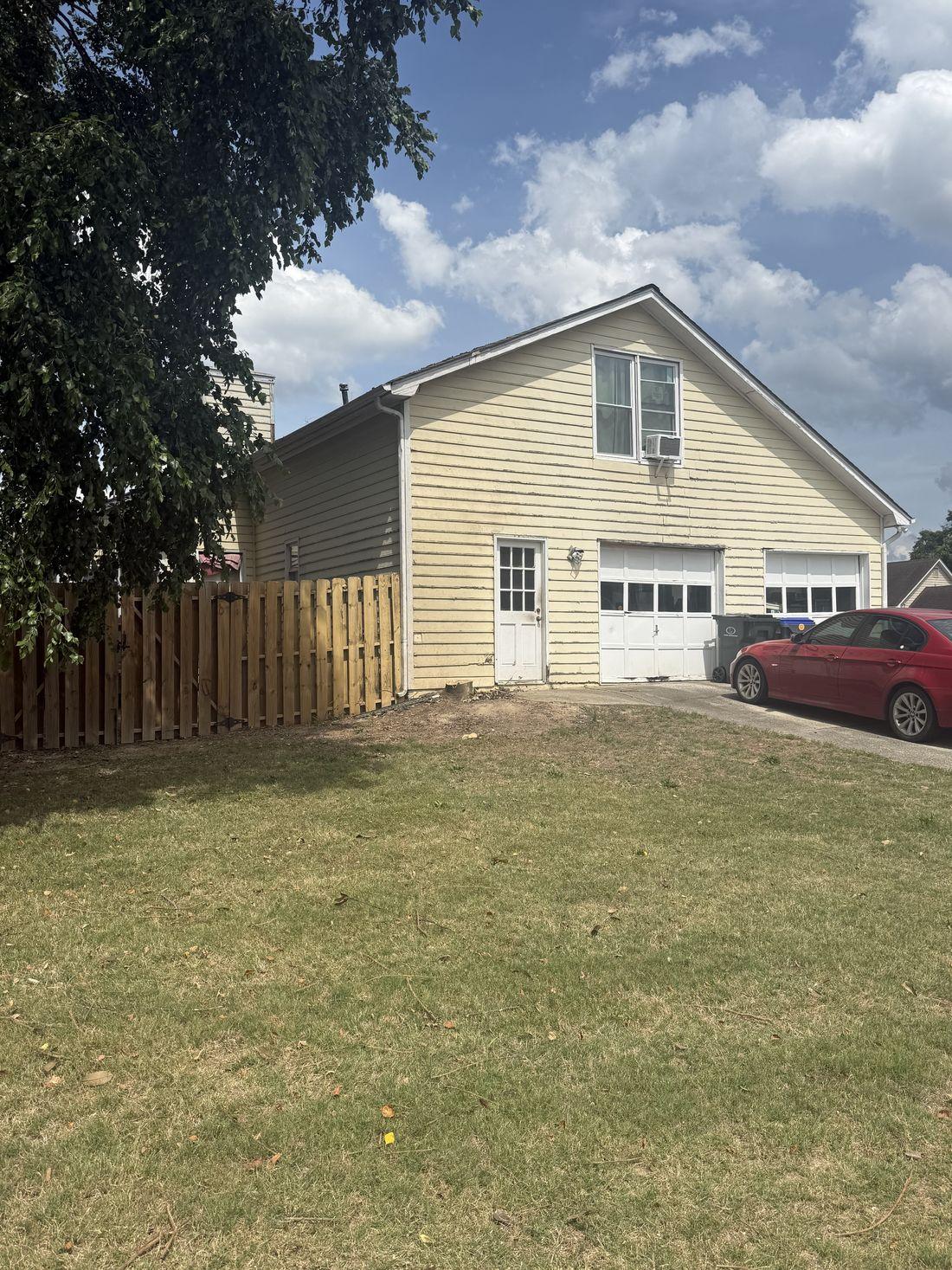 Clean, debris-free yard maintained by Kaus Cuts