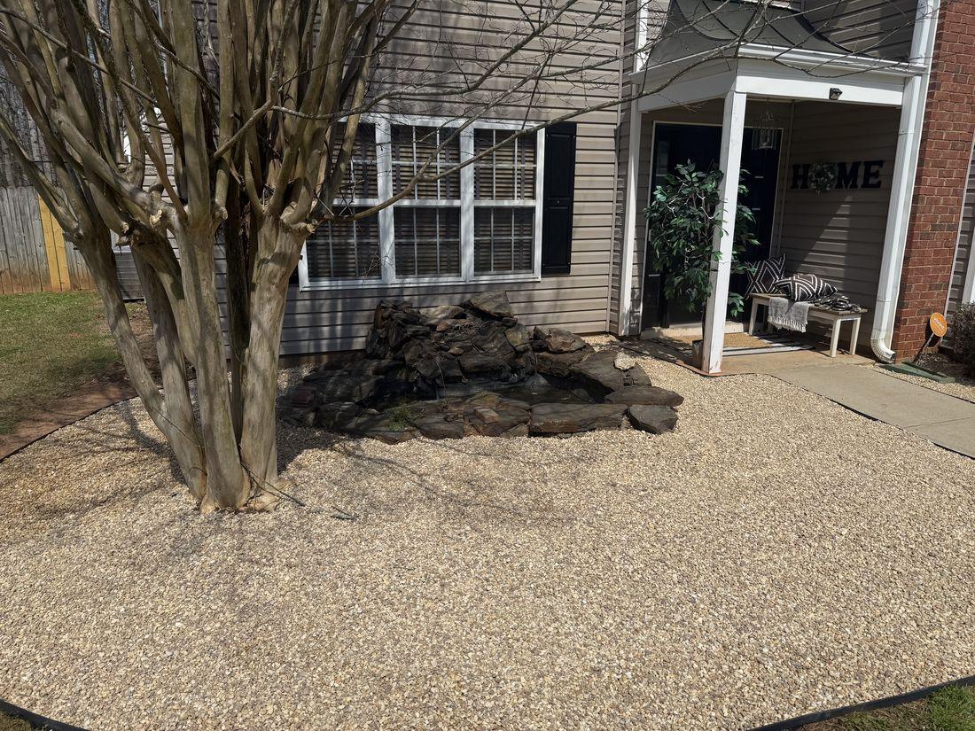 Fresh mulch delivered and spread by Kaus Cuts